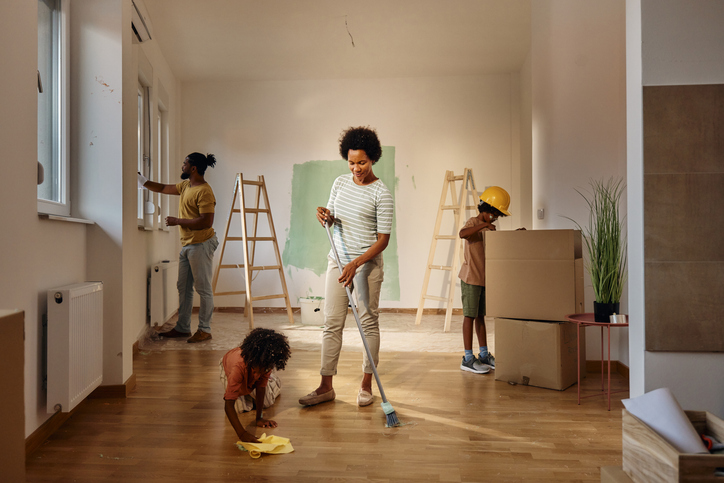 https://www.merrymaids.com/images/articles/African-American-family-cleaning-their-new-home-during-renovations-Merry-Maids.jpg